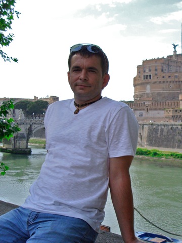 Александр Белан