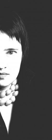 Оксана Коложвари